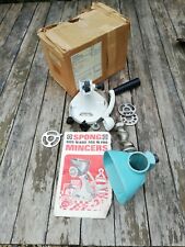 Vintage Spong mincer.. Suction base. Stainless Steel cutters. In original box.